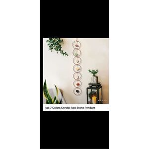 Crystal raw stone and bronze hanging pendent . Long . See measurements.